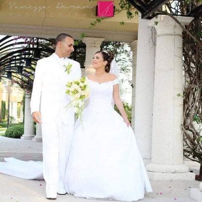 Newlyweds walking together after their ceremony
